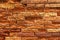 high res of a vibrant, rough, grunge and uneven orange multi tone horizontal brick wall close up texture background