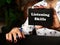 High resolution hand holding black card with written text Listening Skills - closeup shot