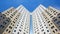 High-rise building facade colored against the sky