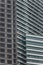 High-rise building facade with glass ans steel near Petronas twin towers in Kuala Lumpur, Malaysia