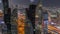 High-rise buildings on Sheikh Zayed Road in Dubai aerial night timelapse, UAE.