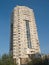 High sandy brown residential building on blu