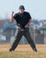 High school baseball umpire makes the call