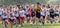 High school boys running at the start of a 5K cross country race