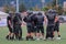 High School Football Team Huddle