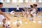 High School Students Playing Dodge Ball In Gym