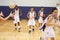 High School Students Playing Dodge Ball In Gym