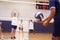 High School Volleyball Match In Gymnasium