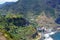 High seacliffs and black sand beaches in Porto da Cruz, Madeiraâ€™s northern coast