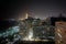 High shot of Abu Dhabi skyline and city towers at night, Corniche view