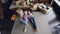 High shot of young couple lying on floor of their new house in bedroom, talking, laughing and holding hands. Carton