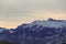 High snow-capped mountains of the Trans-Ili Alatau on a cloudy winter day. Mountains of Kazakhstan, Kazakhstan mountains