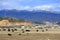 High snow mountains and Yaks in the field, scenery of Shangri-La (Zhongdian), Yunnan, China