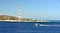 High speed boats and the electricity pylon at Torre Faro