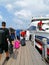 High-speed catamaran stands at the pier