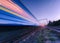 High speed passenger train in motion on the railroad at night