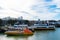 High-speed Rocket Boat, and two Blue and Gold fleet passenger vessels moored at Pier 39 on the edge of the Fisherman Wharf. San