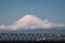 High-speed Shinkansen train over Fuji river with a mesmerizing Fuji mountain on the background