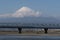 High-speed Shinkansen train over Fuji river with a mesmerizing Fuji mountain on the background