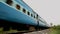 High speed train running on railroad track in India.