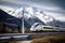 high-speed train zooming past mountain range, with snowcapped peaks in the background