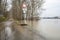 The high state of the river Rhine in western Germany, which emerged from the riverbed, flooded pavement and bicycle path.