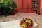 High tables with high chairs vintage style with a beautiful centerpiece of colorful flowers ready to receive the guests