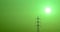 High tension tower at sunrise with green color effect