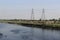 High tension transmission towers near the river Yamuna in Agra
