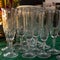 High thin glass set champagne celebration transparent design background