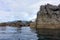 The high tide line in the rocks along a formation of small rocky islands in Gwaii Haanas, Haida Gwaii, British Columbia, Canada