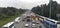 High traffic jam at north highway with school and public transportation bus on normal working morning day