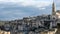 High view of architecture skyline of matera,italy,church,clouds motion timelapse
