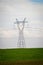 High voltage electric pillar, grass and sky