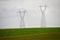 High voltage electric pillar, grass and sky