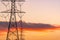 High voltage electric pole and transmission lines in the evening. Electricity pylons at sunset. Power and energy. Energy