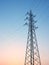 High voltage electric tower and wires - sunset