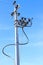 High Voltage Electricity Pillars Cables On Electricity Power Tower On Blue Sky Background. Transmission Lines.