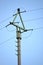 High voltage mast. Blue sky background