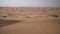 High-voltage power lines in Rub al Khali desert United Arab Emirates stock footage video