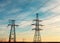 High-voltage power lines at sunset. electricity distribution station. high voltage electric transmission tower