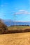 High voltage power tower and beautiful nature landscape in the Czech countryside. Electricity distribution concept. Green deal.