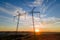 High voltage tower with electric power lines at sunset. Transmission of electricity