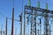 High voltage tower. High voltage. Electricity transmission power lines at sunset (high voltage pylon). Aerial view