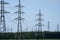 High voltage tower. High voltage. Electricity transmission power lines at sunset (high voltage pylon). Aerial view