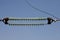 High-voltage Transmission Insulators against the blue sky