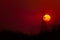 High-voltage transmission tower at sunset, stunning sunset background.