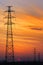 High-voltage wire tower, sunset