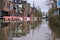 High water level in flooded Dutch street with sandbags in the city of Hoorn 2024