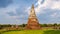 High water at the river in Ayutthaya, Thailand at Wat Chaiwatthanaram during sunset monsoon season